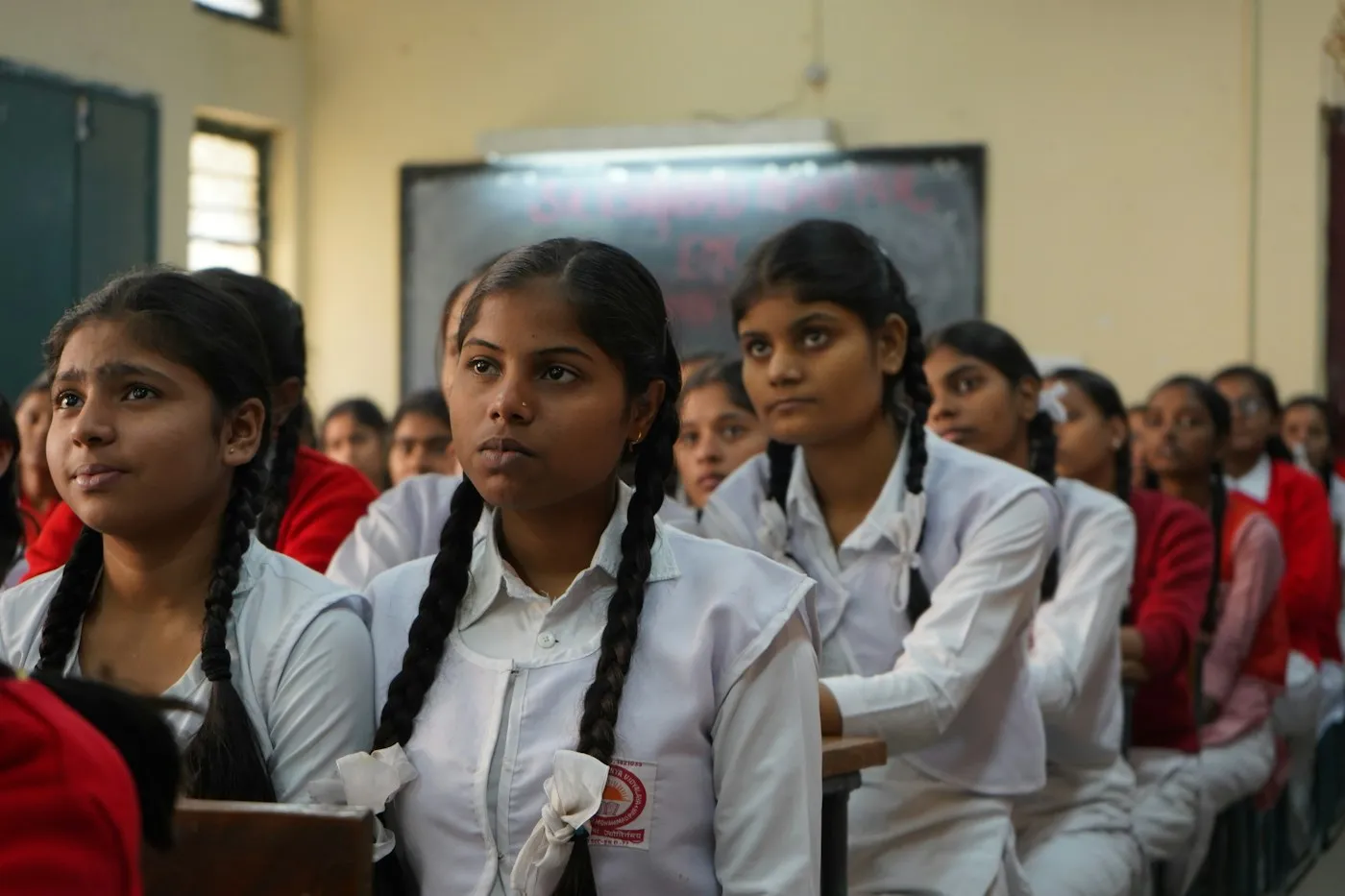 Students listening in a classroom